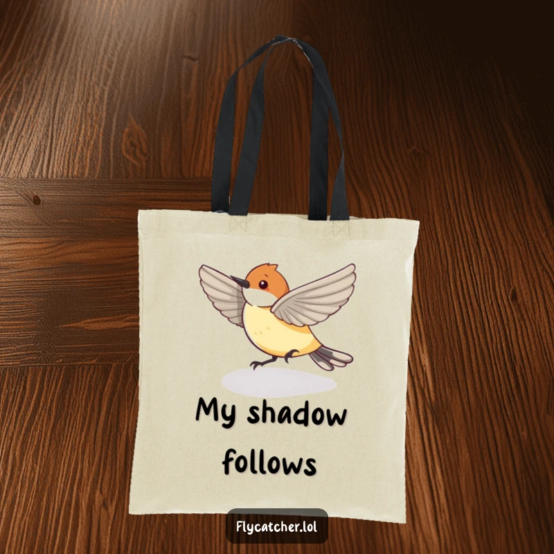 Funny Tote Bag showing a flycatcher bird playfully chasing its shadow, a humorous and quirky accessory.